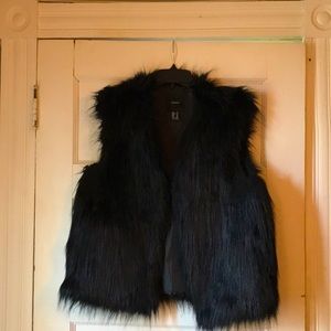 Black faux fur vest